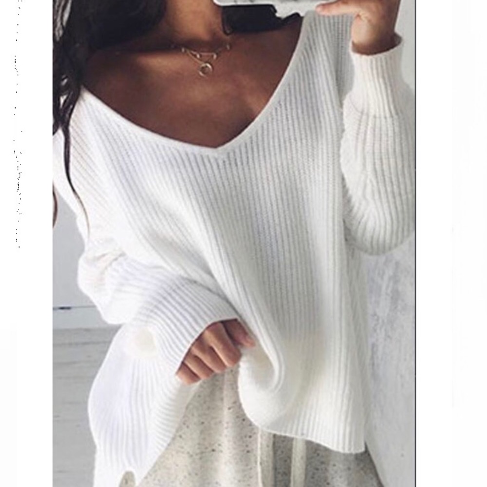 White sweater.